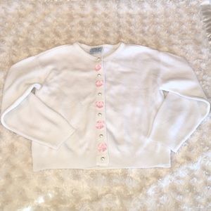 White button up sweater/shrug, pink bows & pearls